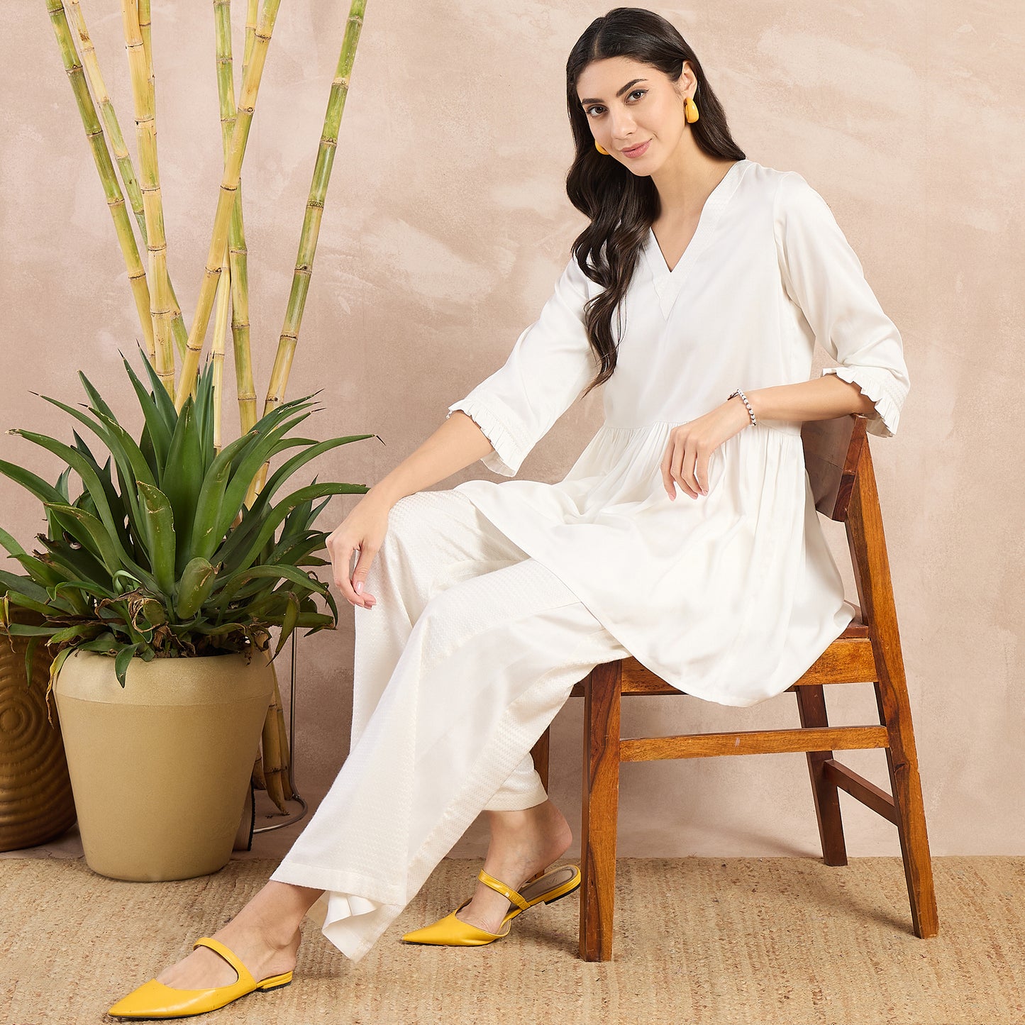 Off-White Herringbone V-Neck Peplum Top and Flared Trouser Set