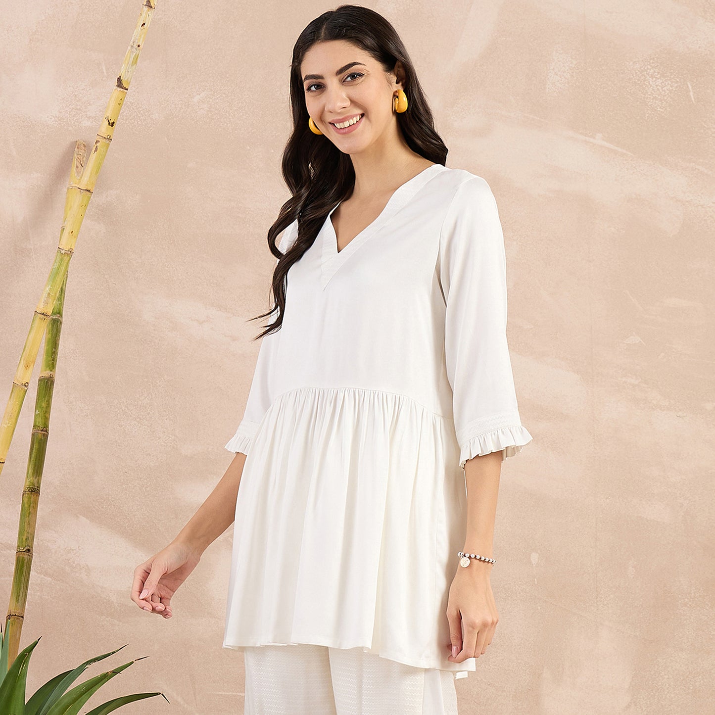 Off-White Herringbone V-Neck Peplum Top