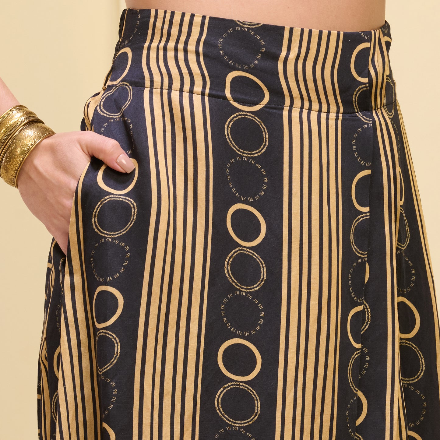Black And Golden Powerful Stripe Print Skirt for Women – Linen Satin – Close Up | First Resort by Ramola Bachchan