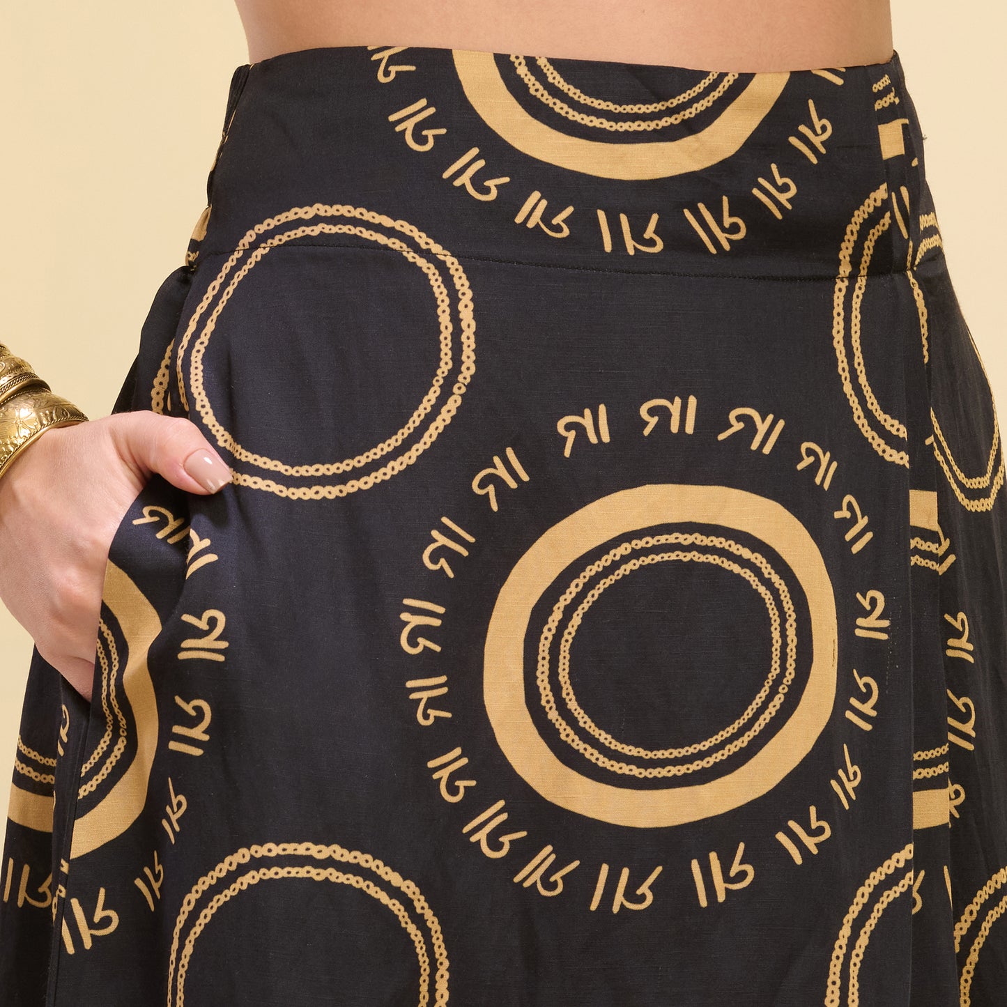 Black and Golden Hand Embroidered Crop Top and Maa Print Full Length Skirt with Front Slit Set
