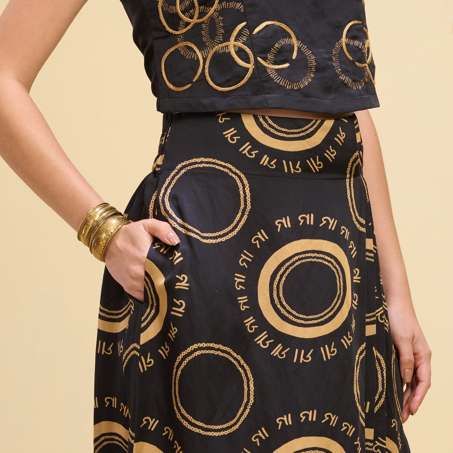 Black and Golden Hand Embroidered Crop Top and Maa Print Full Length Skirt with Front Slit Set